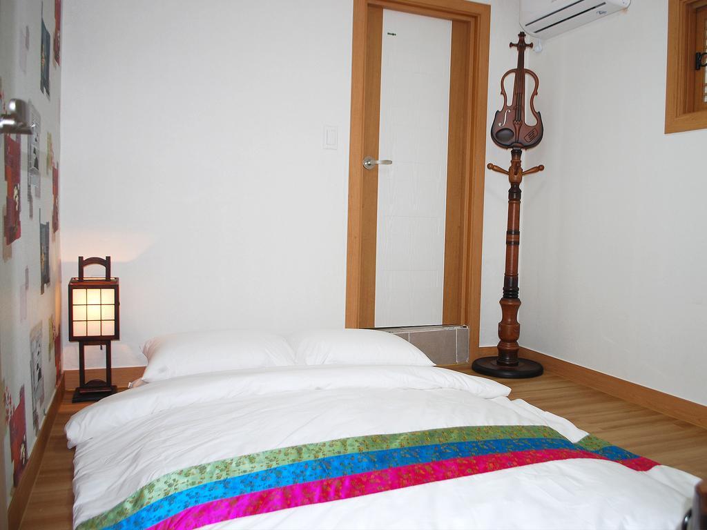 Mago Guesthouse Seoul Værelse billede
