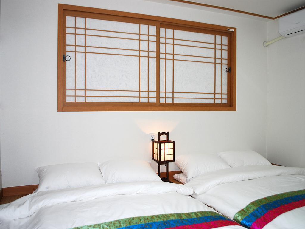 Mago Guesthouse Seoul Værelse billede